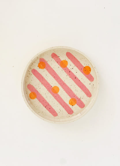 Elevate your dining experience with our 7" hand-painted and handmade ceramic dinner plates. With a mix and match of fun designs, each plate is a unique piece of art for your table. Add a touch of whimsy to your meals and impress your guests with these eye-catching plates.