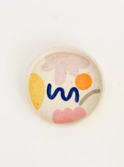 Elevate your dining experience with our 7" hand-painted and handmade ceramic dinner plates. With a mix and match of fun designs, each plate is a unique piece of art for your table. Add a touch of whimsy to your meals and impress your guests with these eye-catching plates.